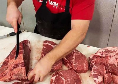 Butcher Cutting Beef